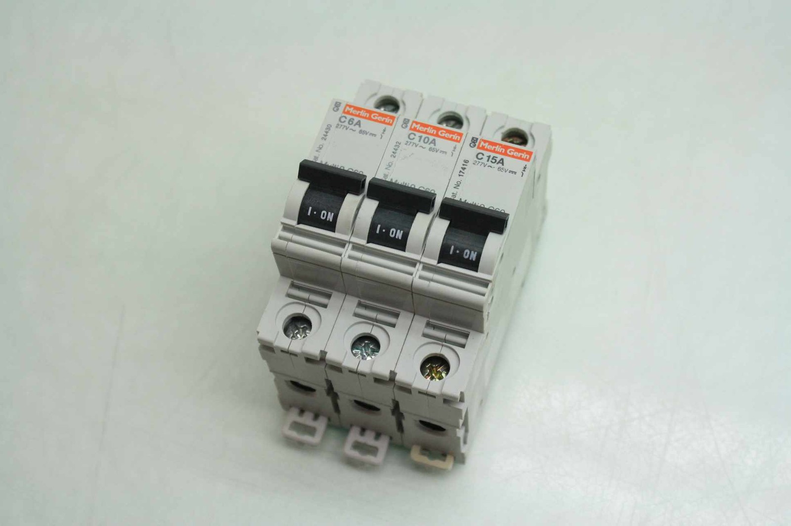 3 Merlin Gerin 24430 24432 17416 Multi 9 C60 Circuit Breakers 277VAC / 6-15A - Used