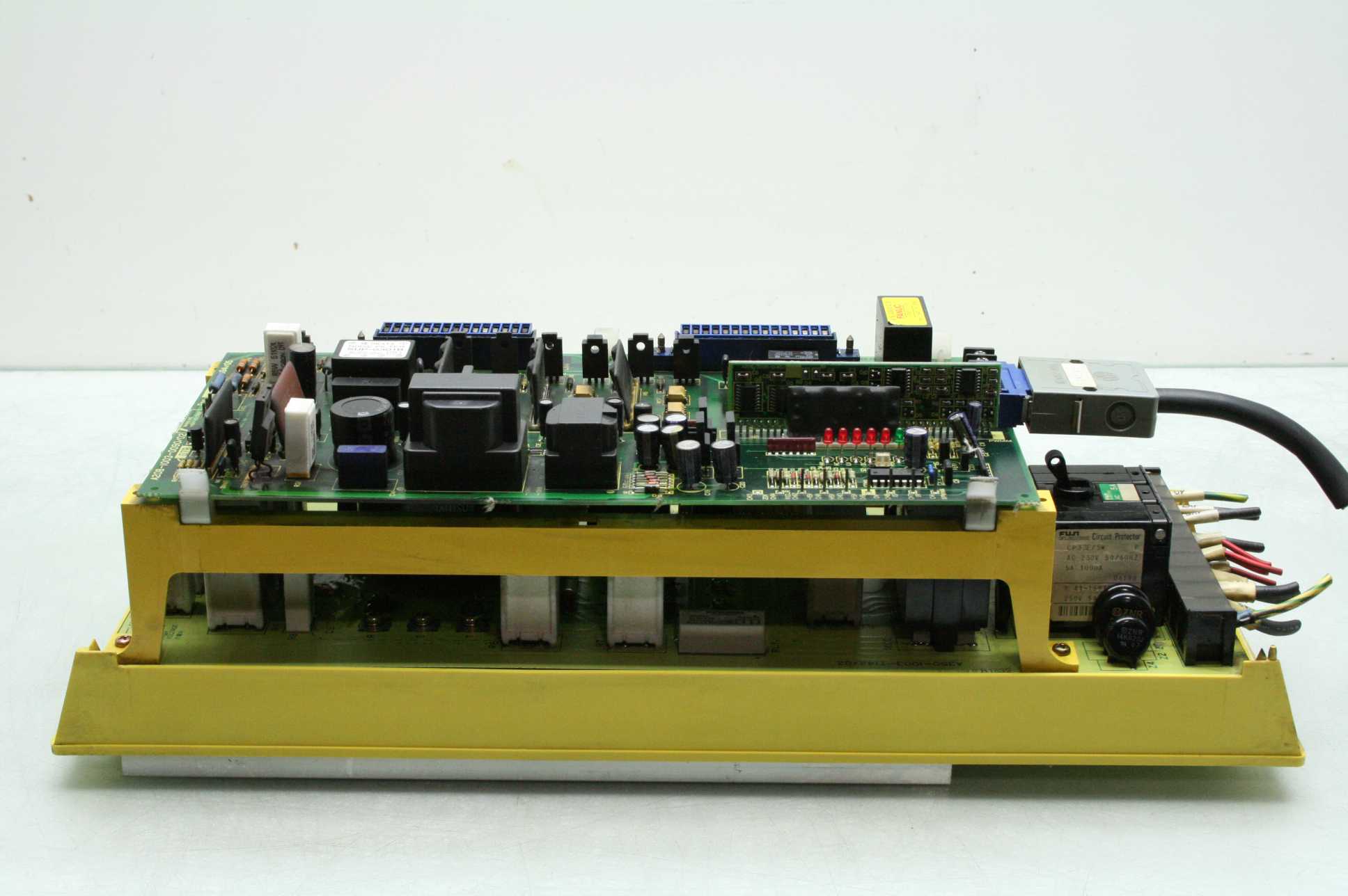 Fanuc A06B-6058-H004 Servo Amplifier + A20B-1003-0140/ 02A Base