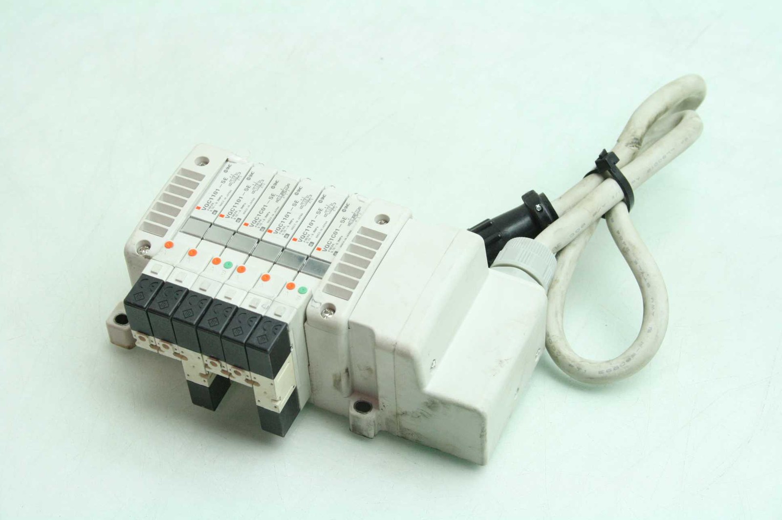 SMC VV5QC11-6 Slot Pneumatic Air Manifold (4) VQC1101-5E Solenoid Valves 24V DC - Used